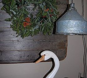 antique christmas decor, christmas decorations, repurposing upcycling, seasonal holiday decor, wreaths, Wabash stove board with greenery