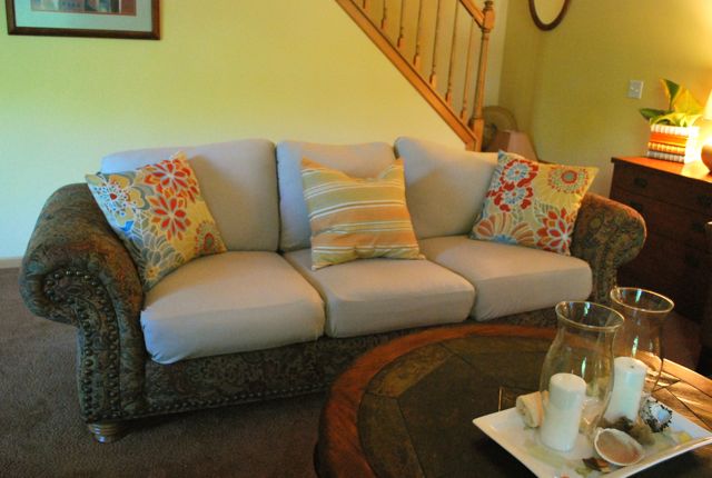 you can update your furniture without upholstery, painted furniture, Some stretch twill fabric wrapped and tucked give the family room couch a summery feel