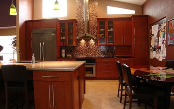 When our homeowner asked Tri-Lite Builders to redesign the kitchen to make it more functional, efficient and