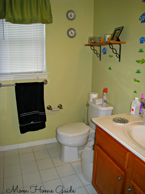 tot to tween bathroom, bathroom ideas, home decor, The bathroom before the re do with the animal wall decals on the walls
