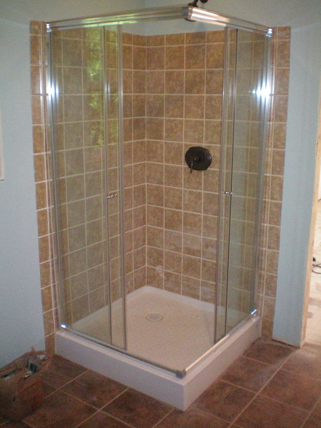 install new showerhead accesories with tub, bathroom ideas, home decor, view the completed project