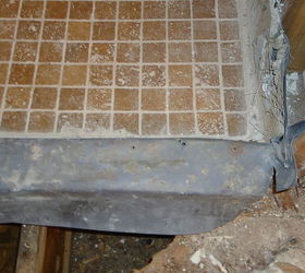 good example of a failing shower due to incorrect installation and having to do it, home improvement, Well after we got the curb up we had nails through the top of the curb and the membrane was cut in the corners