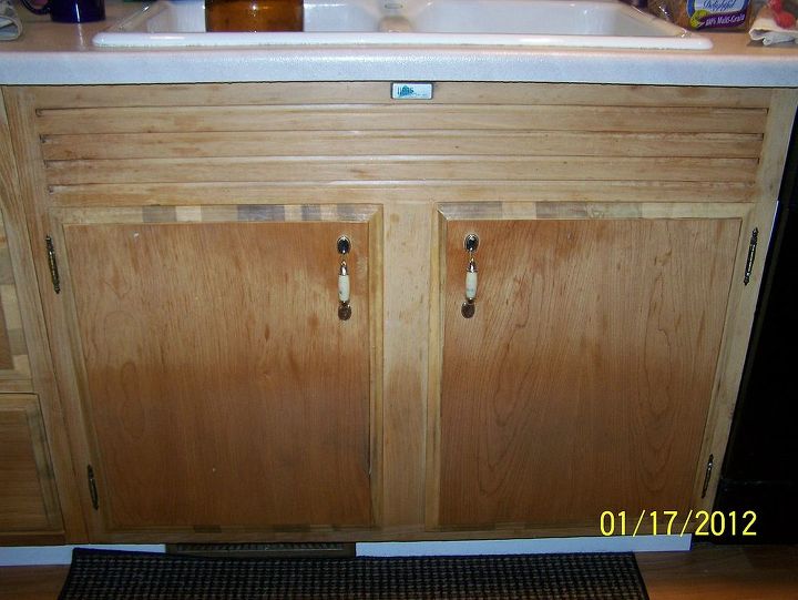 q we have all solid wood kitchen cabinets maybe mahogony not sure need to replace, kitchen cabinets