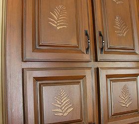 raised fern stencil livens up a boring desk area, kitchen cabinets, painted furniture, shelving ideas, I painted glazed these cabinets with a caramel color paint then glazed w black