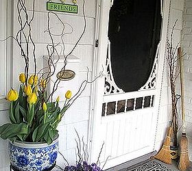 spring is busting out all over, container gardening, flowers, gardening, tulips pansies by the front door