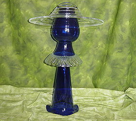 repurposed glass, Sophisticated Lady in Blue Her picture hat is a heavy bowl with raised spiral swirls She is ready for the opera maybe the gentleman in white will be her escort Glass redefined and assembled by Nita Hooper