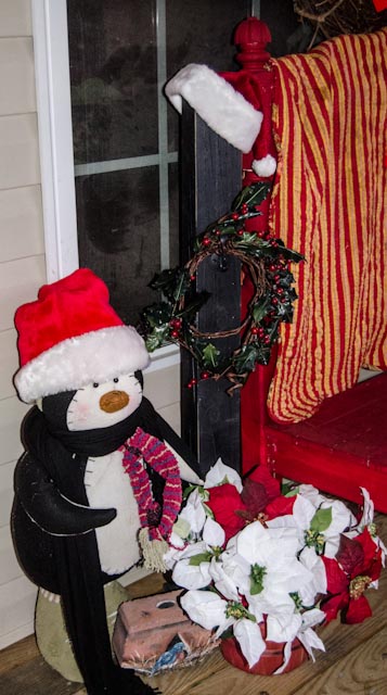 outside decorating, outdoor living, porches, seasonal holiday decor, Mr Penguin creates our guest on their way in