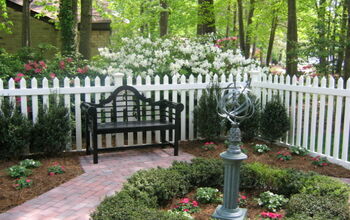 We put in this Colonial Revival garden in the fall of 2009.  It is entered from a sun room in our house.