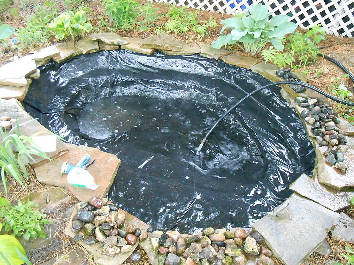 i am inviting you all to see my pond now that it is clean, landscape, outdoor living, ponds water features, Sarting to refill