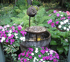 teapot shade garden fountain, gardening, repurposing upcycling, This is my teapot fountain this year I try and change it a little year