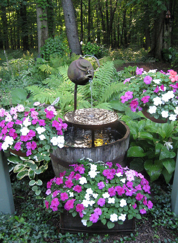 teapot shade garden fountain, gardening, repurposing upcycling, This is my teapot fountain this year I try and change it a little year