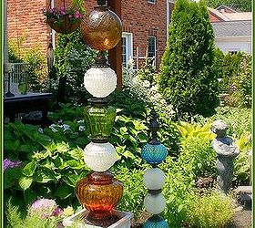 how about a glass globe christmas tree, christmas decorations, gardening, repurposing upcycling, seasonal holiday decor, In case you haven t seen them before these are my summer towers