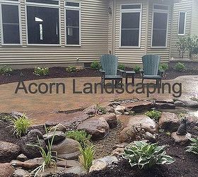 amazing backyard waterfall fish pond with paver patio transformation greece ny by, Landscape Design Greece NY Landscaping Waterfall Garden Pond and stream Aquascape Waterfall Ecosystem Fish Pond Low Maintenance Garden LED Lighting in Greece NY by Acorn Landscaping Certified Aquascape Contractor Rochester NY