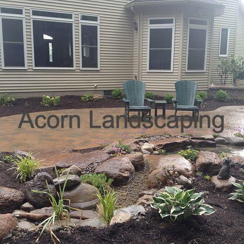 landscape designs, concrete masonry, landscape, outdoor furniture, outdoor living, ponds water features, Landscape Design Greece NY Landscaping Waterfall Garden Pond and stream Aquascape Waterfall Ecosystem Fish Pond Low Maintenance Garden LED Lighting in Greece NY by Acorn Landscaping Certified Aquascape Contractor Rochester NY