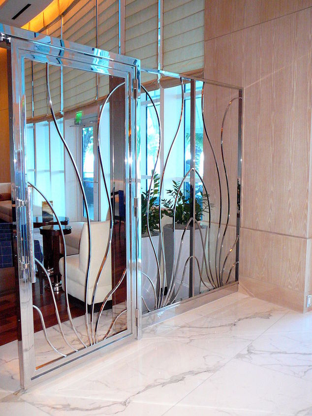 we do custom architectural work for high end homes resorts commerical an, Custom Stainless Steel Room divider at Ritz