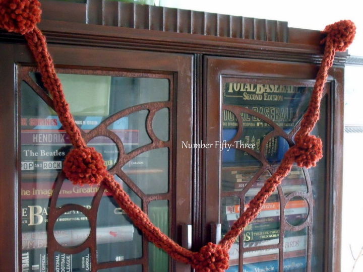 pom pom and finger knit garland, crafts, seasonal holiday decor