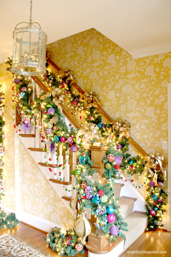 holiday home tour, christmas decorations, seasonal holiday decor, Elaborate garland lights and ornaments to decorate the banister holidayhome