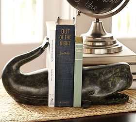 using animals in home decor, home decor, wall decor, These whale bookends from Pottery Barn give an unexpected look to some classic bookcases