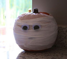 5 frightfully fast halloween decorations, halloween decorations, seasonal holiday d cor, This year skip the knives and transform your pumpkin into an easy to make mummy Wrap gauze cheesecloth or toilet paper work too around your pumpkin pop some wiggly eyes on it and that s it