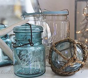 a bit of nautiical decorating with blue mason jars and flowers, home decor, Vintage blue mason jar and a blue glass fishing float They pair nicely together