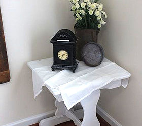 i got to collect and decorate for a family in need, chalk paint, chalkboard paint, doors, home decor, painting, repurposing upcycling, A cute little white side table holds a clock that also received chalkboard paint And I just HAD to inject a tiny bit of rust somewhere so the flower vase was the perfect discreet place