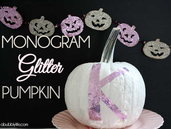 halloween glitter pumpkins, crafts, halloween decorations, seasonal holiday decor, Painted white added monogram with double sided tape better than glue