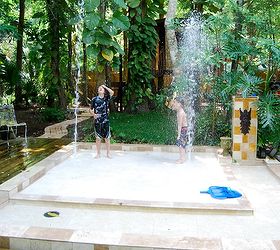 top 10 easy backyard ideas for entertaining, Don t have a pool Make a splash pad out of tarp and sprinklers