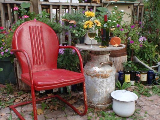 vintage metal and bouncy motel chairs in the garden, gardening, outdoor furniture, outdoor living, painted furniture, Jamie Peterson s bright red