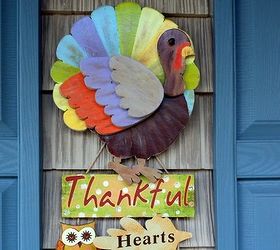 bright cheery painted wood thanksgiving turkey, halloween decorations, seasonal holiday d cor, thanksgiving decorations, Our turkey adds a festive touch to our porch