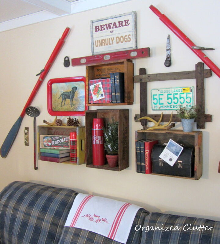 rustic christmas vignettes in the den, seasonal holiday d cor, My junk gallery wall with small seasonal touches and red