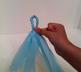 how to host a baby shower day three tissue paper bunting, crafts, home decor, Twist around and seal with hot glue and slide onto twine