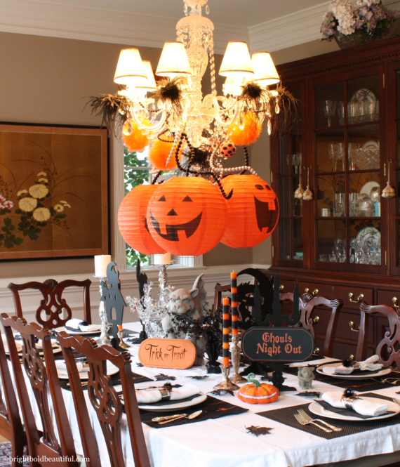 decorate your chandelier, halloween decorations, home decor, seasonal holiday decor, Hang eye catching pumpkin lanterns