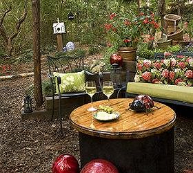 this award winning outdoor space was created by recycling fallen trees recycled, Old Well cover coverted to a fire pit with removeable table top