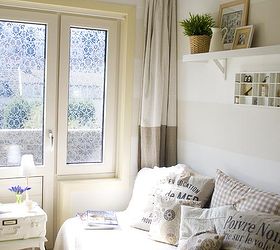 cozy up your guest room to use as a reading room after the guests have left, bedroom ideas, home decor, Add pillows to a guest bed and turn it into a cozy reading spot