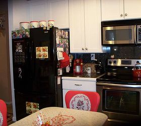 my 1940 s inspired kitchen renovation, home improvement, kitchen design, Fridge wall Found wonderful affordable solid wood cabinets at CliqStudios Lower cab has pull out drawers for pots and pans I got the range and microwave from separate sellers on Craigslist for a fraction of regular cost
