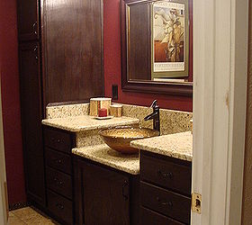 i have to share my bathroom remodel with you guys my husband and i are big diyers, bathroom ideas, home decor, This is the after shot The only thing we hired done was the granite My huband custom did the cabinets himself We bought unfinished kitchen cabintes from our local Home Depot and changed them to work in the bathroom