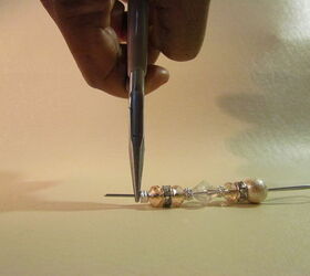 candle snuffer with dingle dangle bling, String on beads to the length you want the handle