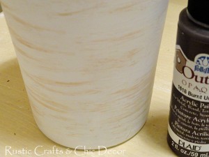 recycle an old drinking glass into a fun pencil holder, crafts, repurposing upcycling, Next I diluted some burnt umber acrylic paint with water and brushed on lightly in spots to give it a warm rustic feel