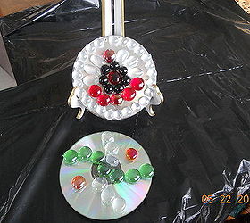 q my newest jewelry or candy or whatever tier and cd hangers, crafts, cd s hang out on my tree