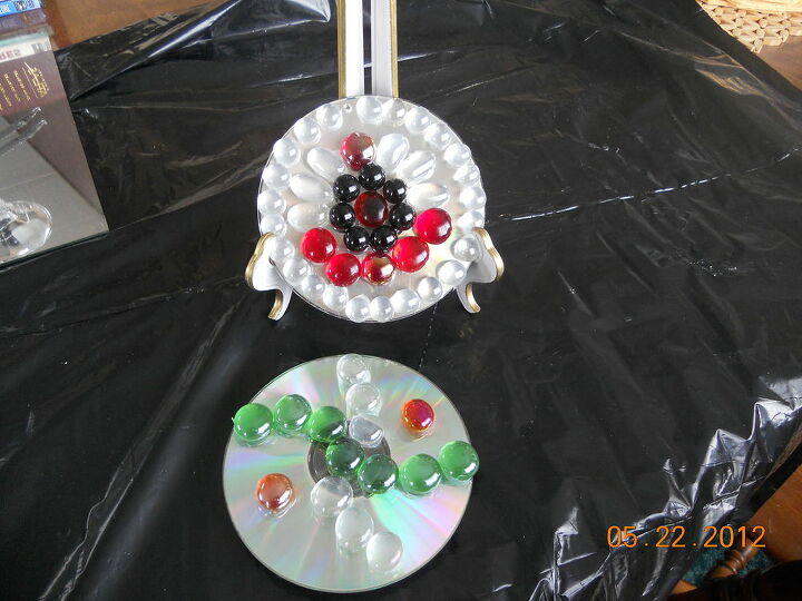 q my newest jewelry or candy or whatever tier and cd hangers, crafts, cd s hang out on my tree