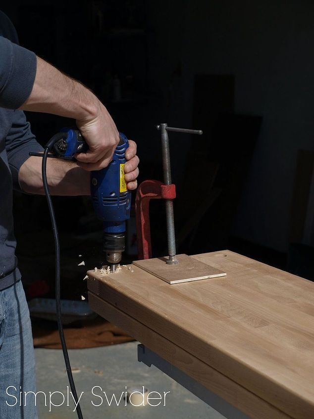 industrial console table tutorial, painted furniture, After cutting the butcher block to length we drilled the pipe holes using a 1 in forstner bit