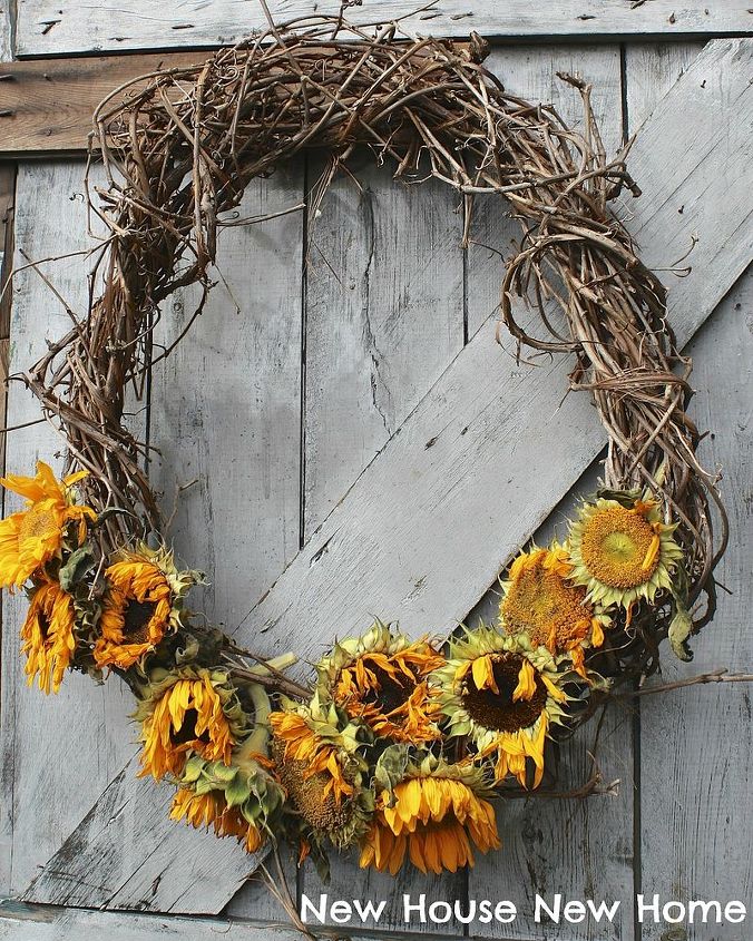 using faded flowers in my fall decor, seasonal holiday d cor, wreaths, The stems were cut and the flower heads tucked into this grapevine wreath