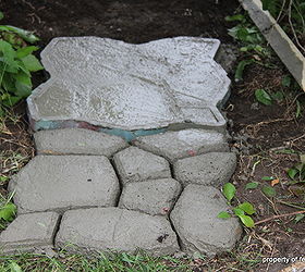 building a cobblestone path with moss, concrete masonry, flowers, gardening, landscape, outdoor living, We mixed up one bag of ready mix placed the form on a level area and filedl the form pushing the mix into the corners Screed off and let the mold sit for about two minutes and then remove