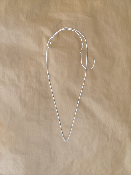 project make a heart from a wire hanger tutorial mysoulfulhome com, crafts, Hold the two sides of your heart together to check for symmetry Does it have to be perfect