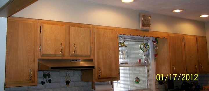 q we have all solid wood kitchen cabinets maybe mahogony not sure need to replace, kitchen cabinets