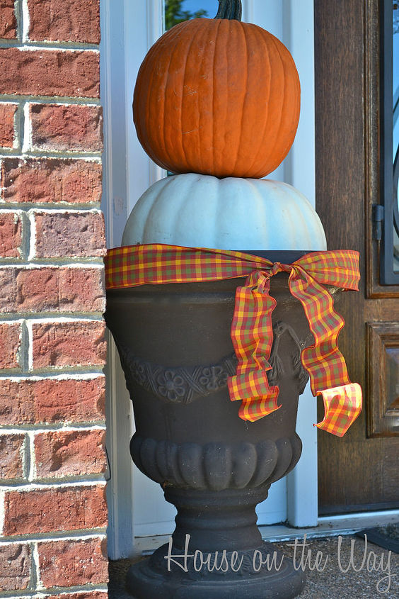 fall front porch decorations, doors, outdoor living, porches, seasonal holiday decor, Stacking pumpkins is a great way to add interest to your front porch