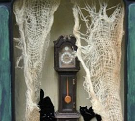 easy halloween decoration to make, crafts, halloween decorations, seasonal holiday decor, This grandfather clock fit perfectly in the window