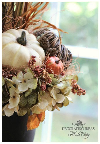 autumn flower arrangement, seasonal holiday decor, White and grapevine pumpkins are the centerpiece of this arrangement