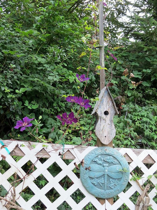 birdhouses, diy, gardening, outdoor living, pets animals, woodworking projects, This one is old and weathered It has been part of this garden for many years
