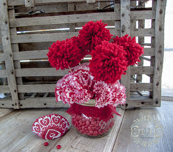 red hots pom poms and cupcake holders valentines day gifts, crafts, mason jars, seasonal holiday decor, valentines day ideas, You have an adorable gift in just a few simple steps
